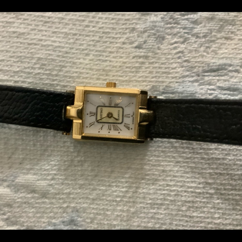 Gold, black leather strap Wrist watch
